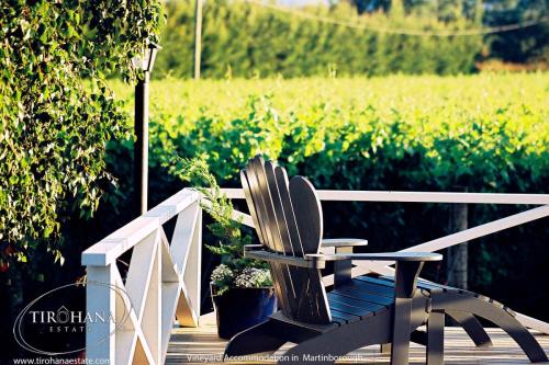 Sit outside and relax, overlooking Tirohana's Martinborough vines